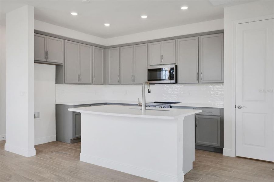 Furnished interior view inside a new home in Seaire, Parrish (Image 7).