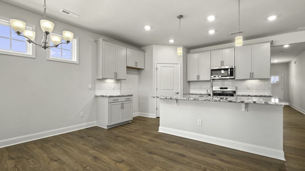 Furnished interior view inside a new home in The Villas at Kinsley, Jamestown (Image 4).