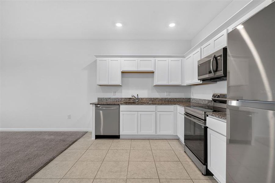 Furnished interior view inside a new home in , St. Cloud (Image 6).