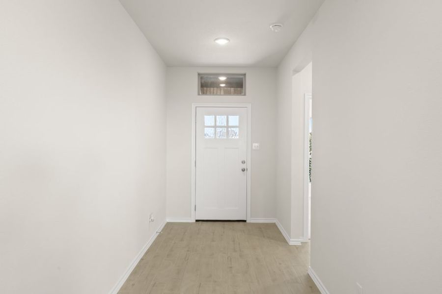 Front exterior of a new home in Myrtle Creek, Waxahachie, TX, highlighting curb appeal (Image 6). Front exterior of a new home in Myrtle Creek, Waxahachie, TX, highlighting curb appeal (Image 6).