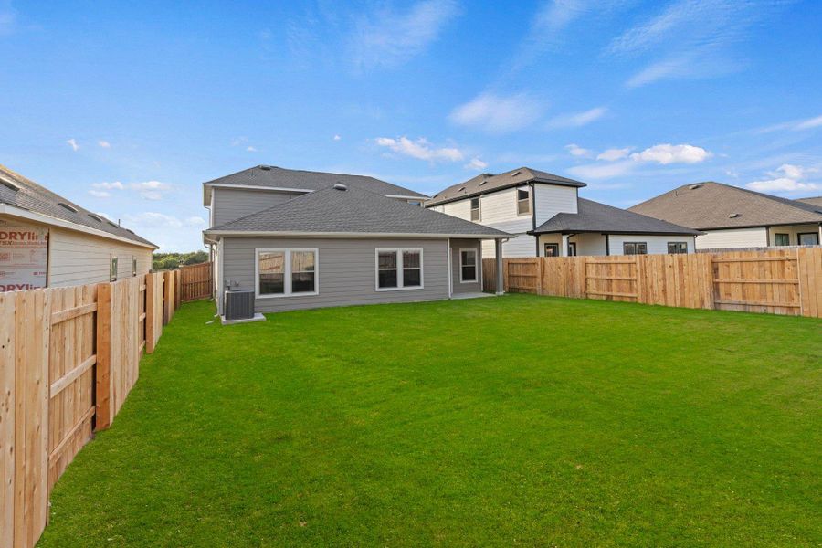 Rear of Home and Private Backyard