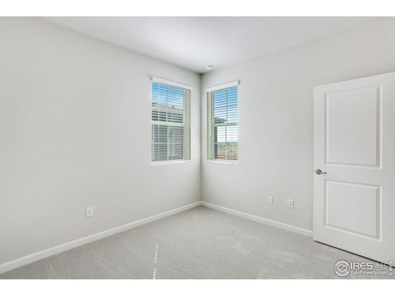 Spacious, unfurnished interior of a new home in Westside Crossing, Berthoud (Image 24).