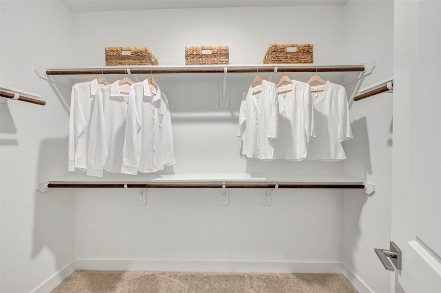 Primary walk-in closet (*Photo not of actual home and used for illustration purposes only.)