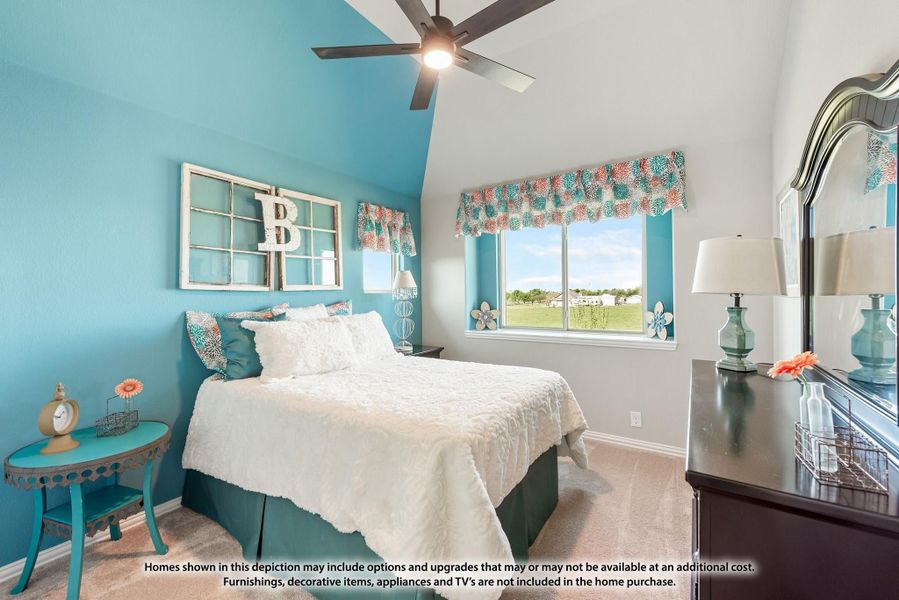 Bedroom with teal accent walls, vaulted ceiling, ceiling fan, and carpet flooring Bedroom with teal accent walls, vaulted ceiling, ceiling fan, and carpet flooring