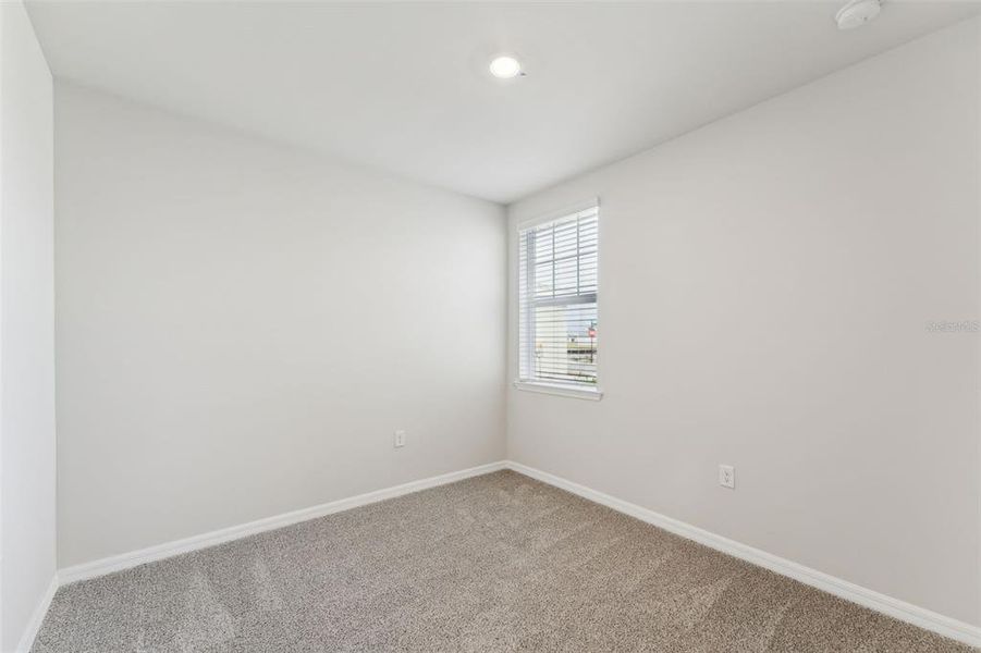 Spacious, unfurnished interior of a new home in Crescent Lakes - Premier Series, Punta Gorda (Image 20).