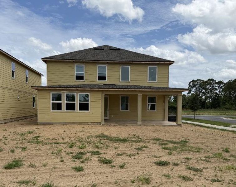 Exterior details and patio area of a home in Northlake at Ovation, Winter Garden (Image 4).