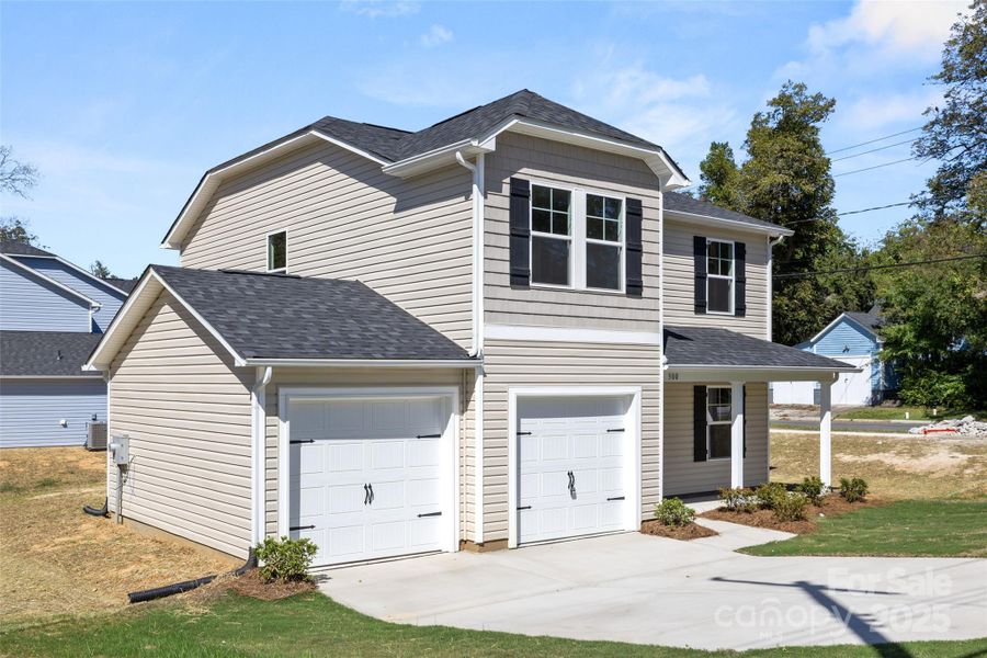 Front exterior of a new home in , Lancaster, SC, highlighting curb appeal (Image 2).