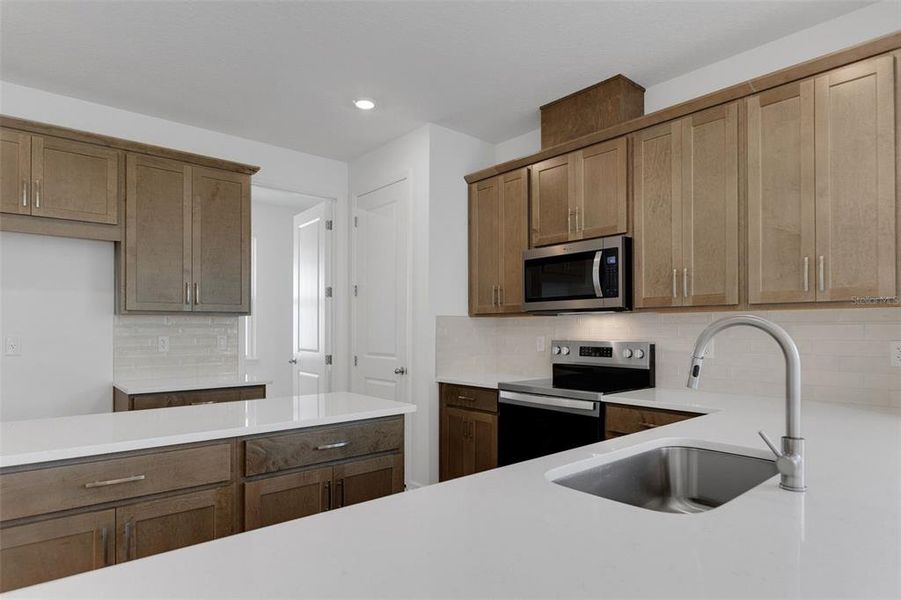 Furnished interior view inside a new home in Crossroads at Kelly Park, Apopka (Image 7).