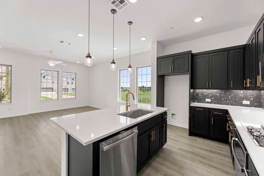 Open Kitchen-Living-Dining Room featuring the Noir Collection Open Kitchen-Living-Dining Room featuring the Noir Collection