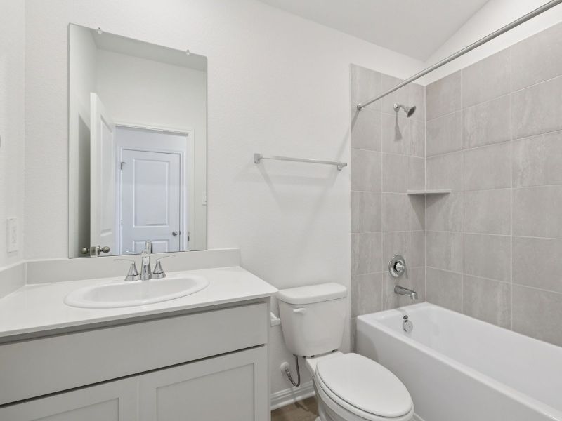 Furnished interior view inside a new home in Creekfall, Burnet (Image 5).