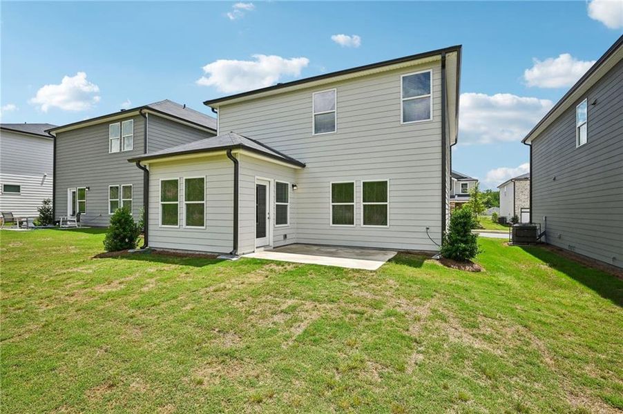 Front exterior of a new home in Hawthorne Station, College Park, GA, highlighting curb appeal (Image 25).