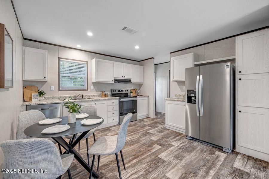 Furnished interior view inside a new home in , Jacksonville (Image 11). Furnished interior view inside a new home in , Jacksonville (Image 11).