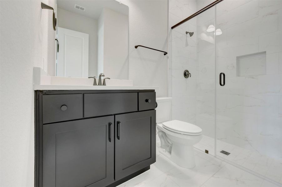 Furnished interior view inside a new home in Harvest Green 65', Richmond (Image 3).