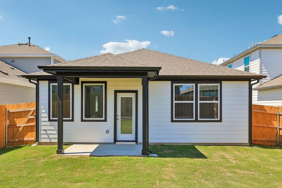 Exterior details and patio area of a home in Trinity Ranch, Elgin (Image 26).