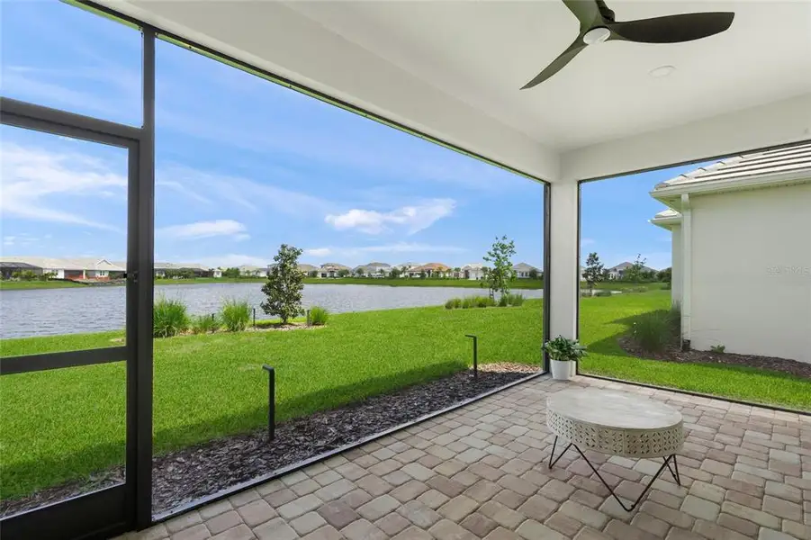 Exterior details and patio area of a home in LakeHouse Cove at Waterside, Sarasota (Image 4). Exterior details and patio area of a home in LakeHouse Cove at Waterside, Sarasota (Image 4).