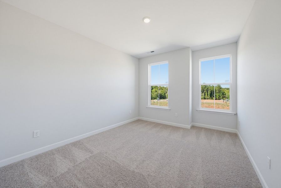 Spacious, unfurnished interior of a new home in Sweetbrier, Durham (Image 24).