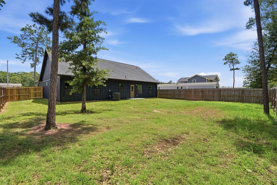 Exterior details and patio area of a home in , Conroe (Image 3). Exterior details and patio area of a home in , Conroe (Image 3).