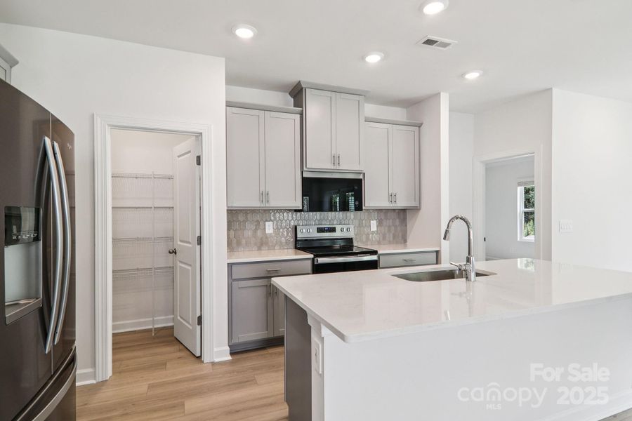 Photo is not of the actual home but is an inspirational photo of builder’s model home and may depict options, furnishings, and/or decorator features that are not included.