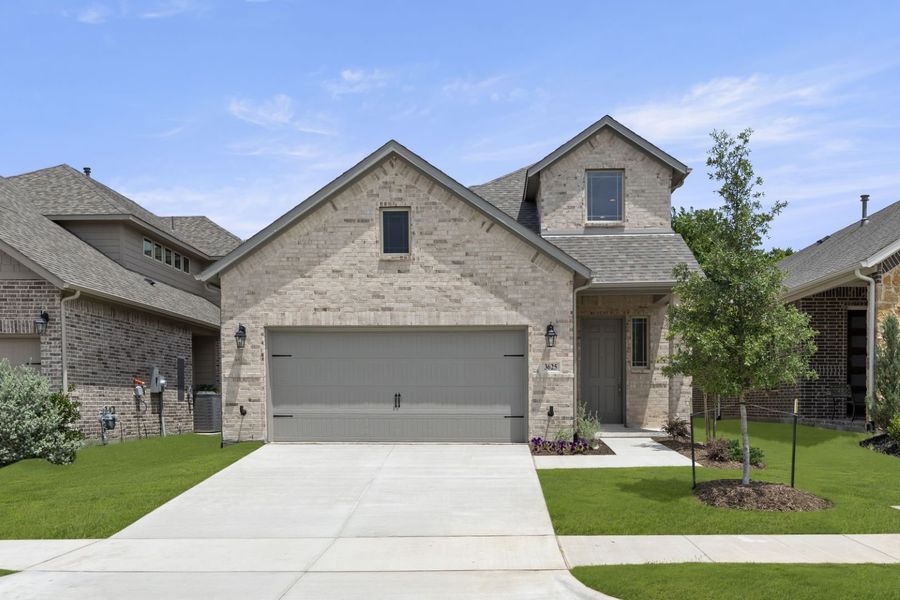 Front exterior of a home in the Villas at Long Branch community, located in Rowlett, TX (Image 9). Front exterior of a home in the Villas at Long Branch community, located in Rowlett, TX (Image 9).