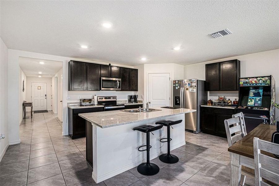 Furnished interior view inside a new home in Fairways at Twisted Oaks, Beverly Hills (Image 12).