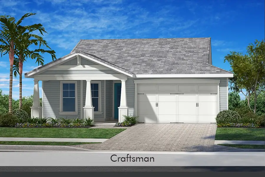 Representative exterior photo of a completed home built from the Cay by Homes by Towne in Shellstone at Waterside, Sarasota, FL (Image 12).