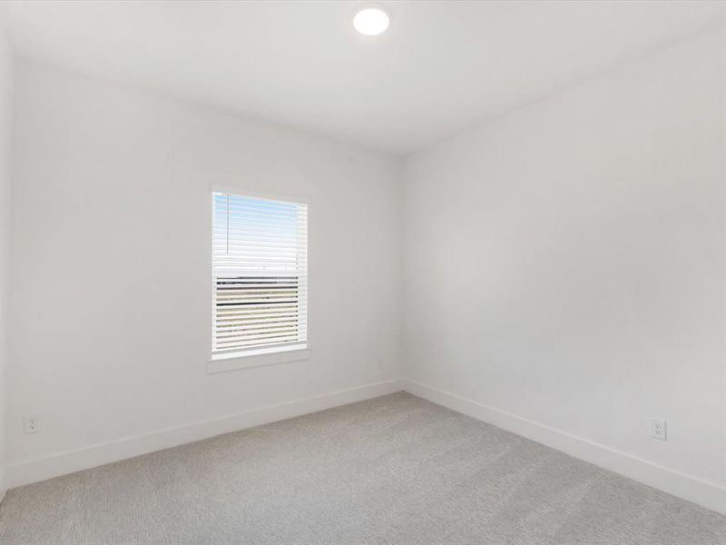 Spacious, unfurnished interior of a new home in Royal Court, Little Elm (Image 25).
