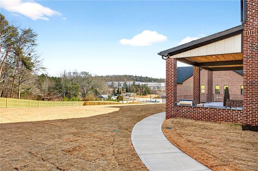 Exterior details and patio area of a home in , Buford (Image 36).