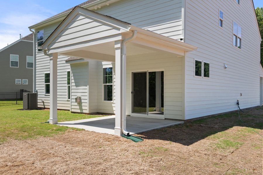Exterior details and patio area of a home in Fiddler's Ridge, Advance (Image 22).