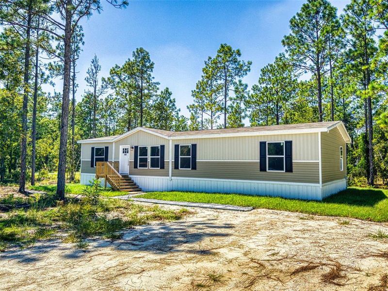 Exterior details and patio area of a home in , Williston (Image 25). Exterior details and patio area of a home in , Williston (Image 25).