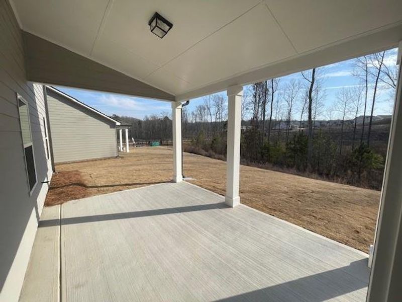 Exterior details and patio area of a home in Ponderosa Farms Estates, Gainesville (Image 3).