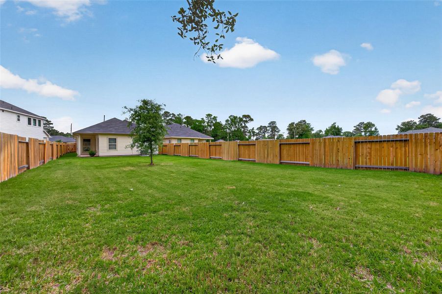 Exterior details and patio area of a home in , Huffman (Image 3).