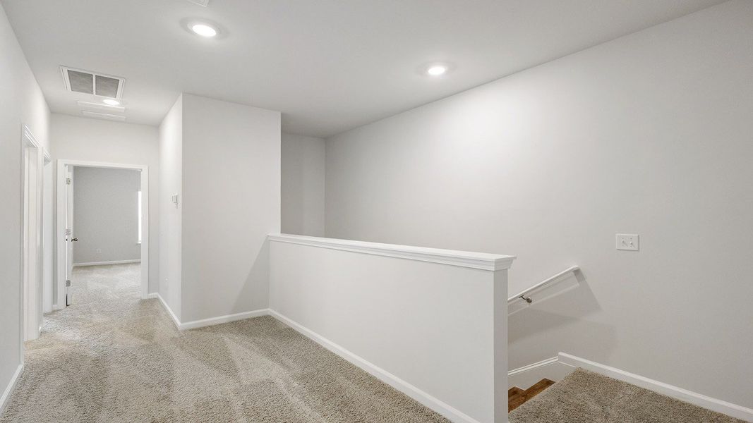 Spacious, unfurnished interior of a new home in The Crossing at St. James, Summerville (Image 23). Spacious, unfurnished interior of a new home in The Crossing at St. James, Summerville (Image 23).
