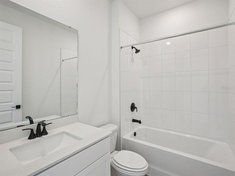 Furnished interior view inside a new home in Two Rivers - Signature Series, Zephyrhills (Image 13).