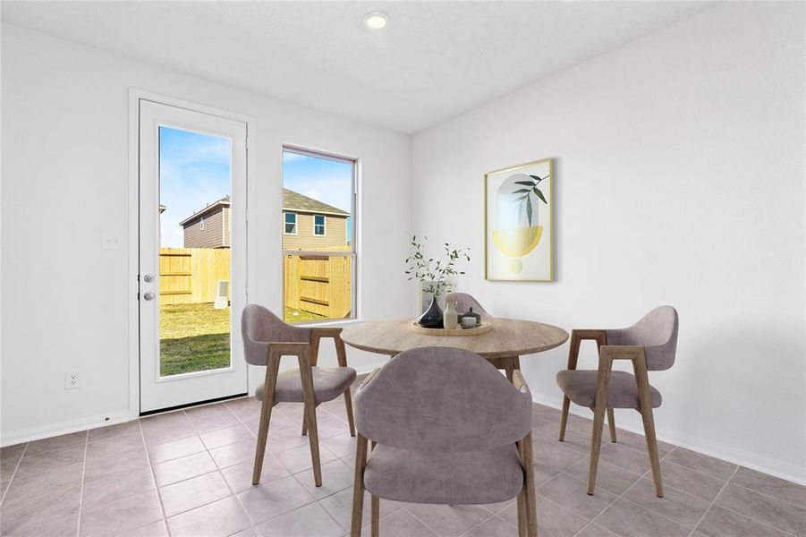 Start your day off right with a cup of coffee sitting with your family in the dining area! Featuring large window, custom paint, tile flooring and recessed lighting.