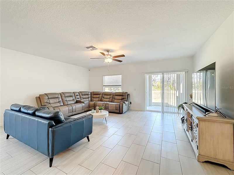 Furnished interior view inside a new home in Berry Bay: The Executives, Wimauma (Image 48).