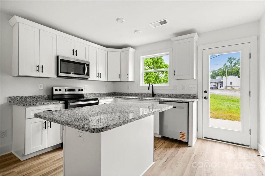 Furnished interior view inside a new home in , Albemarle (Image 7).