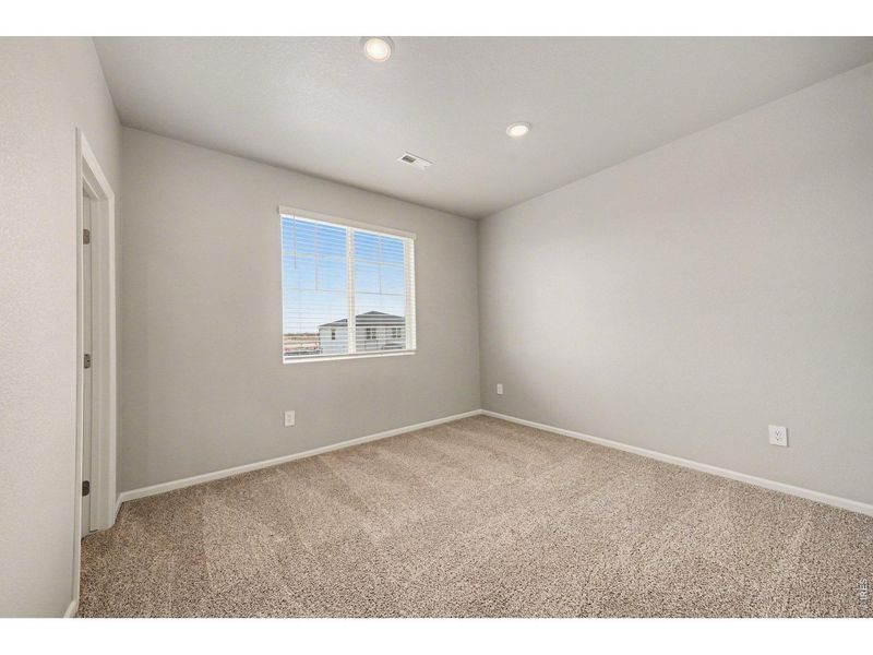 Spacious, unfurnished interior of a new home in Poudre Heights: The Alpine Collection, Windsor (Image 24).