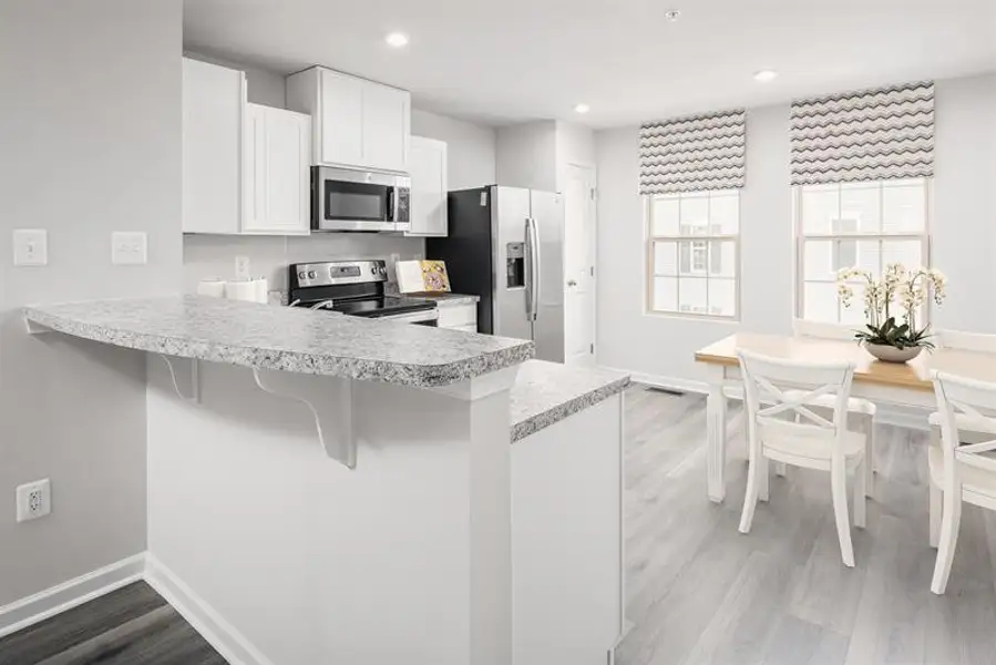 Representative furnished interior of a home built from the Spencer by Ryan Homes in Northerly, Charlotte (Image 6).