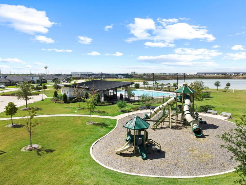 Family-friendly playground surrounded by open green areas and nearby lake views — an inviting spot for playtime and weekend fun. Family-friendly playground surrounded by open green areas and nearby lake views — an inviting spot for playtime and weekend fun.
