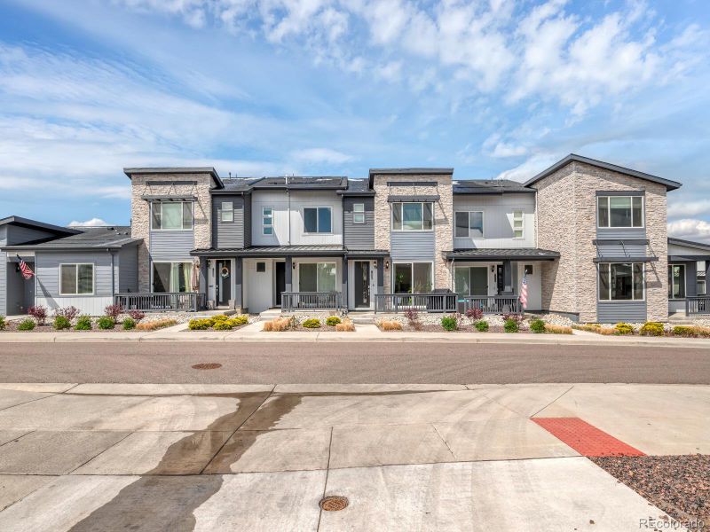 Front exterior of a new home in Green Gables, Denver, CO, highlighting curb appeal (Image 25).
