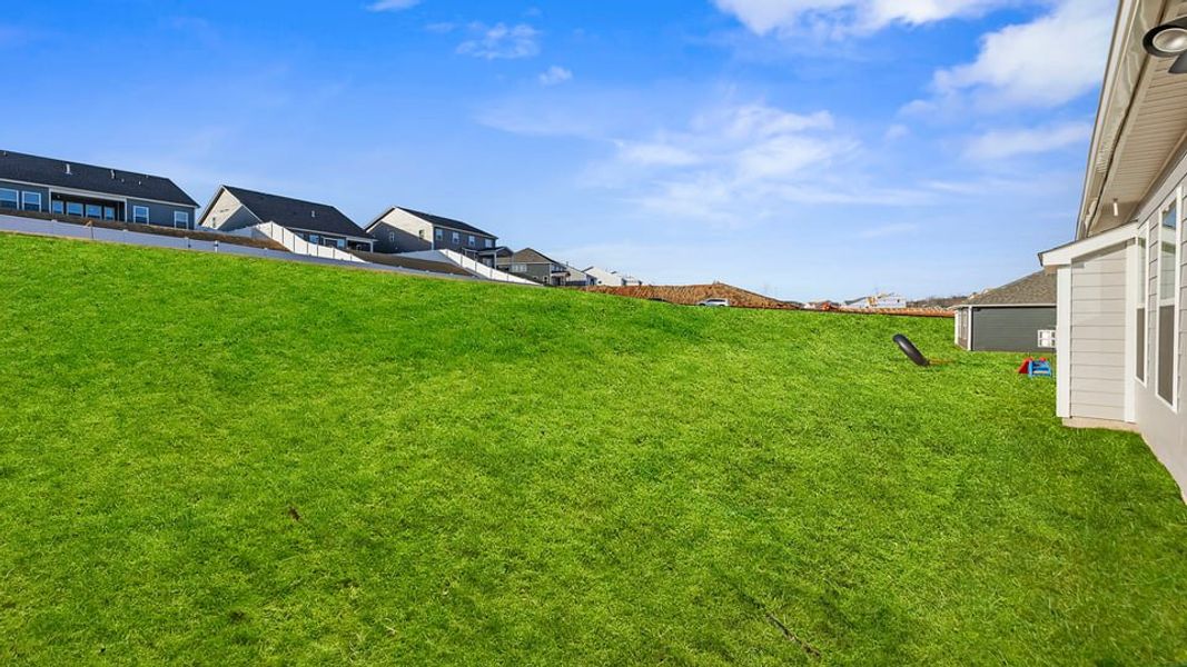 Exterior details and patio area of a home in Whitehawk Meadows, Travelers Rest (Image 23).