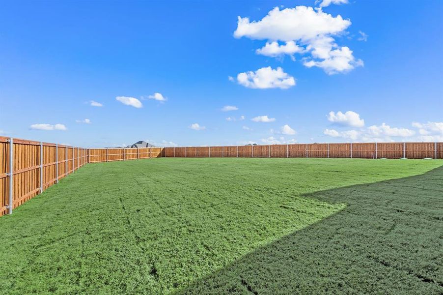 Exterior details and patio area of a home in Settlers Glen, New Fairview (Image 23).