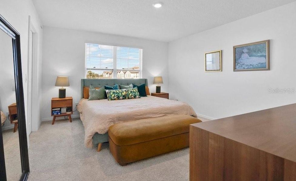 Furnished interior view inside a new home in Northlake at Ovation, Winter Garden (Image 13).