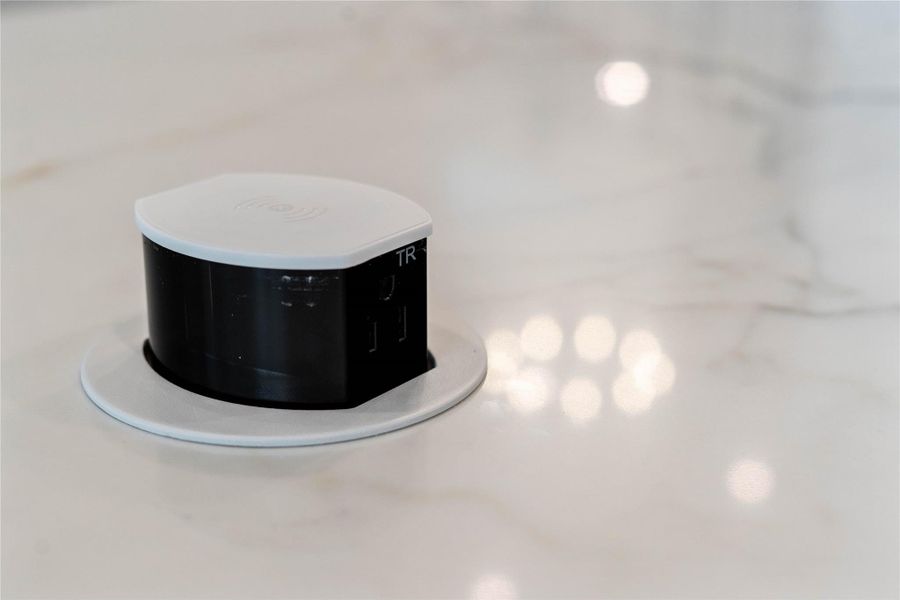 Thoughtful modern luxury meets ultimate convenience with this sleek, flush-mount pop-up countertop outlet. Keep your expansive kitchen island pristine and completely clutter-free while cooking, entertaining, or working from home.