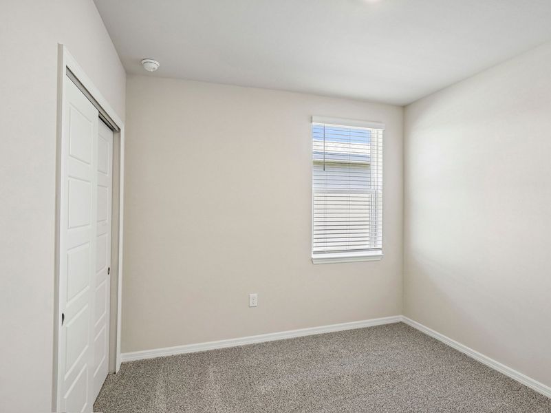 Spacious, unfurnished interior of a new home in Crescent Lakes - Premier Series, Punta Gorda (Image 17).