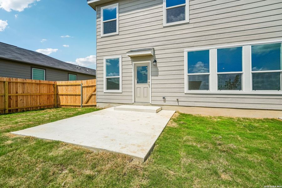 Exterior details and patio area of a home in Woodside Farms, Seguin (Image 18).