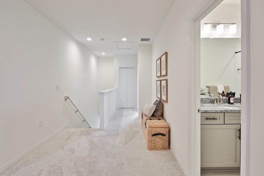 Representative furnished interior of a home built from the Morgan by Neal Communities in SkySail, Naples (Image 11).