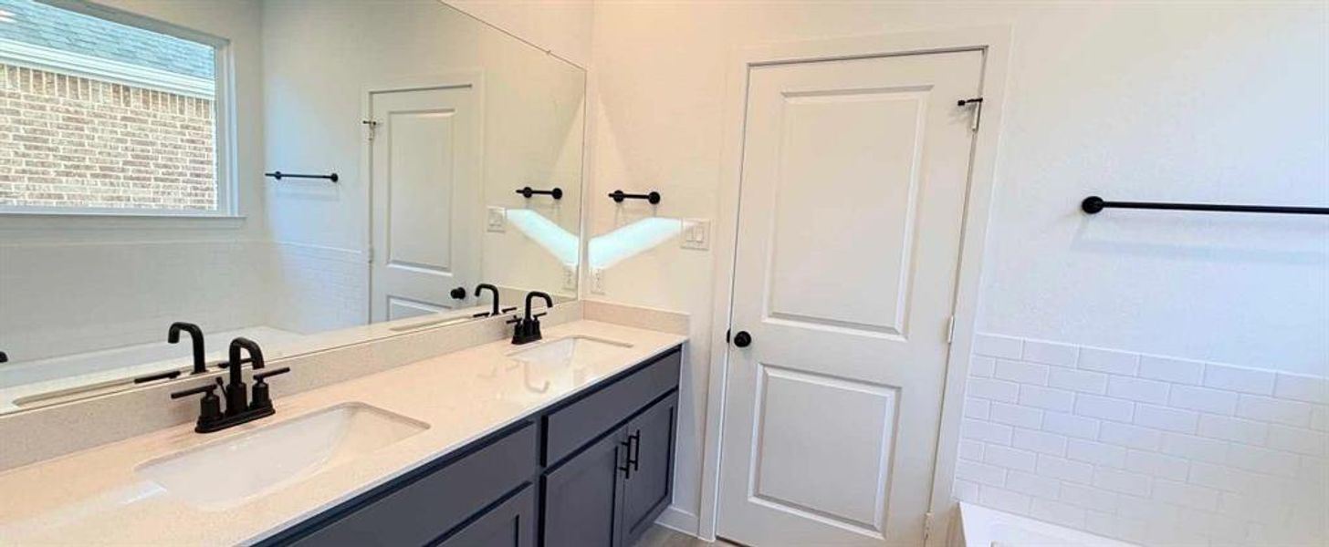 Primary Bathroom Construction Progress featuring the Minimalist Collection