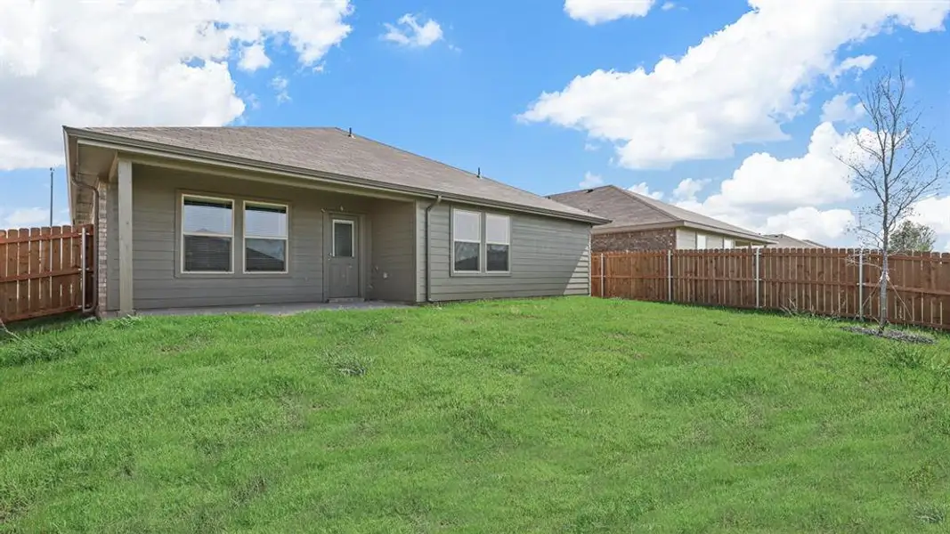 Exterior details and patio area of a home in Highlands at Chapel Creek, Fort Worth (Image 3).