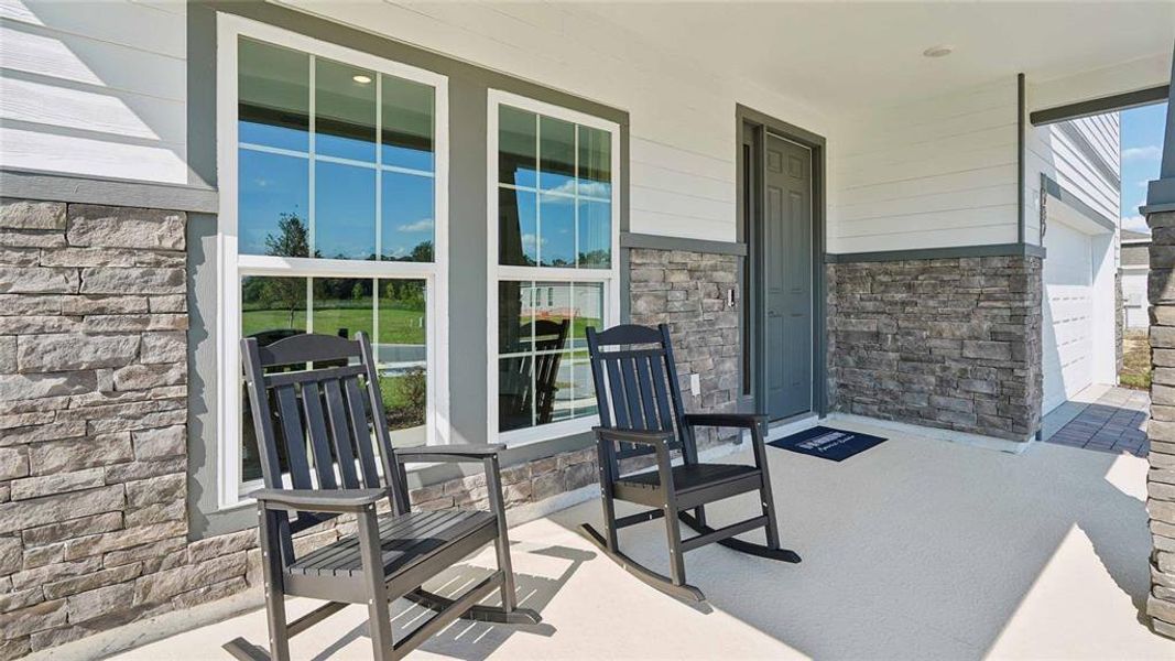 Exterior details and patio area of a home in Ridge at Heath Brook, Ocala (Image 3).